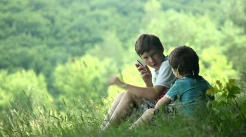 Two Child Funning In Park, Outdoors Stock Footage 11275633