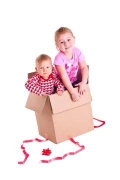Two child in gift box Stock Photos