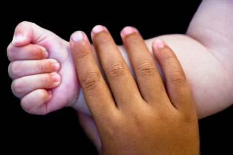 Two child hands Stock Photos