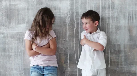 Two child smiling and plaing inside the house. indoors Stock Footage 64090445