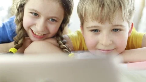  Two child using technology live video call with smartphone.  Stock Footage 78071418