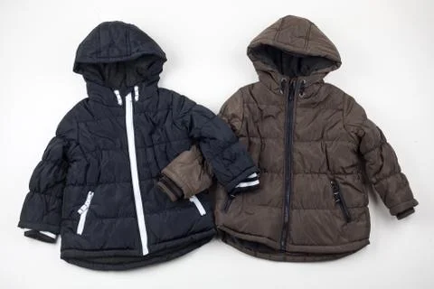 Two child warm jackets Stock Photos