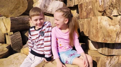 Two children 7-10 years old joke, laugh and talk Video stock 50649886