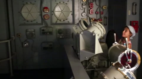 Two children in aircraft carrier simulator in Air and Space Museum Stock Footage 57142913