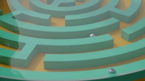 Two children are playing a giant maze game in the park. Stock Footage 279378311