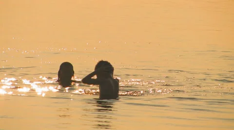 Two children bathing Stock Footage 35152411