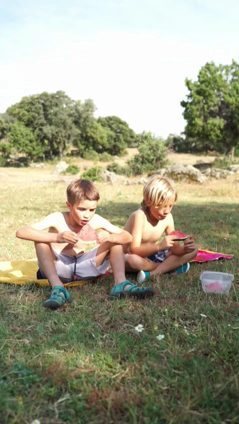 Two children bathing in a natural pool in summer Stock Footage 277194336