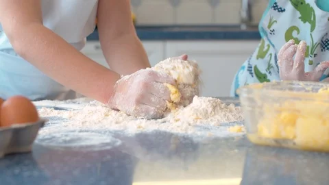 Two children cooking together Stock Footage 124923673
