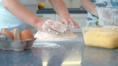 Two children cooking together Stock Footage 124923685