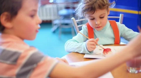 Two children draw paint Stock Footage 374554