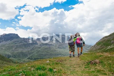 Two children during a summer camp in the mountains Stock Photos