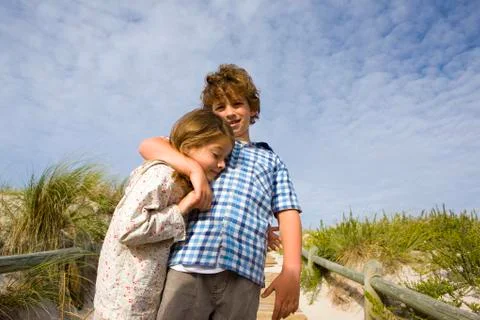 Two children hugging Stock Photos