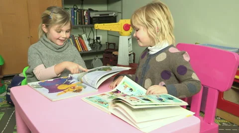 Two children play Stock Footage 61569988