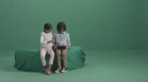 Two Children playing with Digital Tablet Stock Footage 54188692