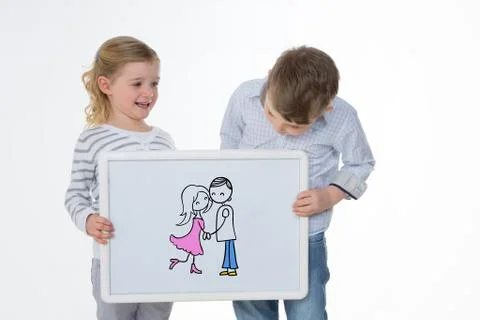 Two children playing with white panel Stock Photos