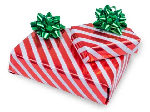Two christmas gift boxes with red and white stripes and green bows isolated on Stock Photos