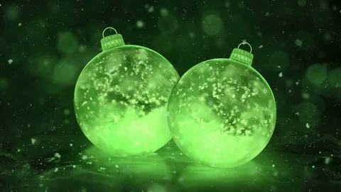 Two Christmas New Year Green Ice Glass Baubles Decorations snow background loop Stock Footage 82438152