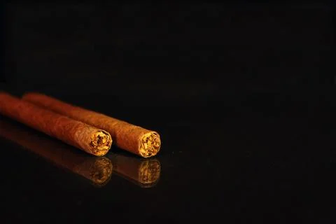 Two cigarillos Stock Photos