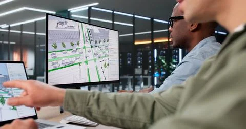 Two Civil Engineers Use 3D Software Analyzing Urban Road Traffic Flow Data. Foto stock