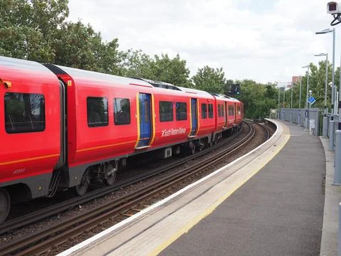 Two class 707 electric multiple units at Hampton Wick station in London in the Stock Photos