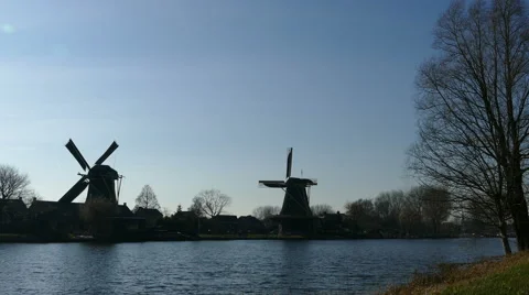 Two Classic Dutch Windmills Stock Footage 47761779