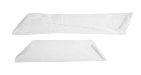 Two clear plastic adhesive tapes with wrinkles and air bubbles isolated on a  Stock Photos