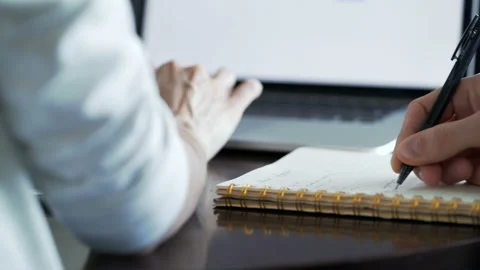 Two clever students study in library desk closeup isolated hands. Young friends Stock Footage 199492112