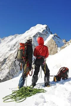 A two climber reaching the summit Stock-Fotos