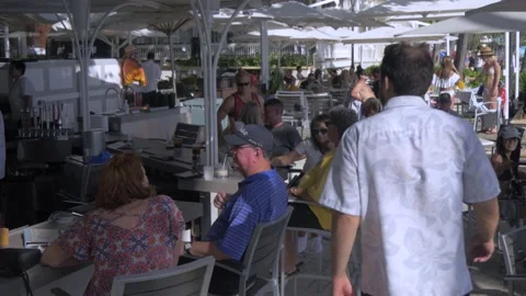 Two Clips Of A Beach Bar On Waikiki Beach, Honolulu, Hawaii Stock Footage 154356078