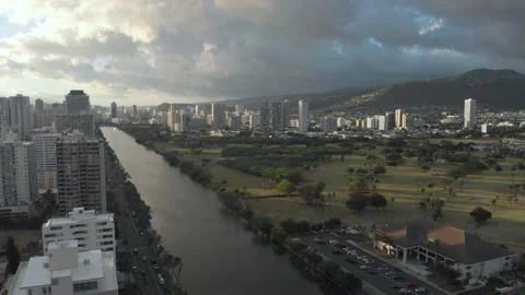 Two Clips Of Drone Flying Over Ala Wai Canal In Waikiki, Honolulu, Hawaii Stock Footage 154164374
