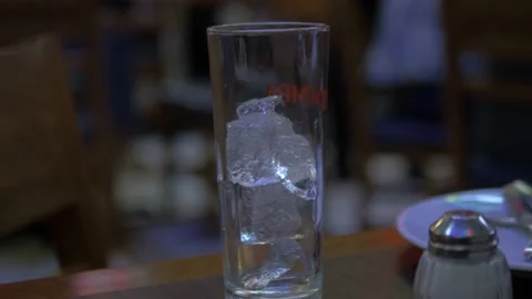 Two Clips Of A Glass Of Ice In A Restaurant In Mexico City Stock Footage 154637715