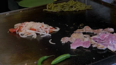 Two Clips Of Man Grilling Meat And Vegetables At Taco Shop In Mexico City Stock Footage 154646205