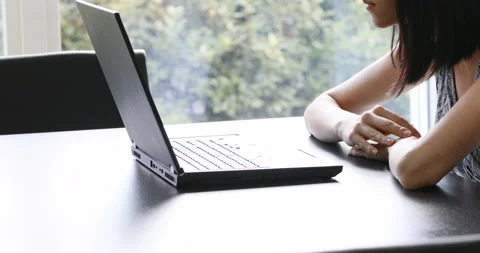 (two clips in one) a girl opens a laptop, a girl closes a laptop Stock Footage 158741005