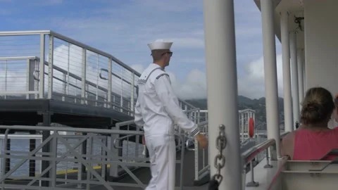 Two Clips Of Young Navy Sailor At USS Arizona Memorial, Pearl Harbor, Hawaii Stock Footage 154496485
