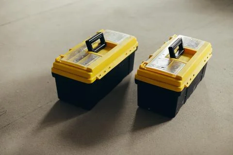 Two Closed Tool Cases With Handles And Latches Positioned Side By Side. Stock Photos