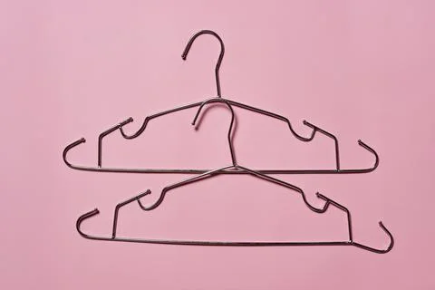 Two clothes hangers Stock Photos