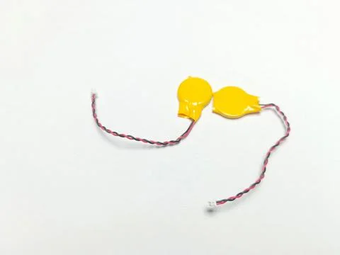 Two CMOS BIOS Backup Lithium Batteries with Connector Wires Stock Photos
