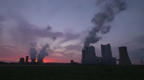 Two Coal-fired Power Plants at Dusk, Pan Stock Footage 52999440