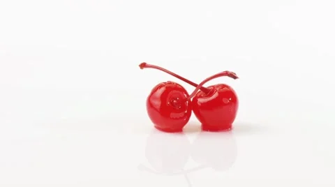 Two cocktail cherries Stock Footage 8571821