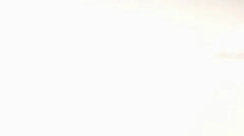 Two cocktail glasses, one empty, one filled with cocktail Stock Footage 8571098