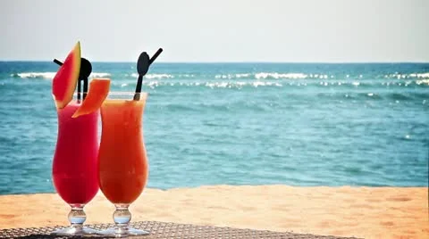 Two cocktails on the beach Stock Footage 12238982
