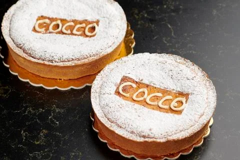 Two coconut cake with icing sugar Stock Photos