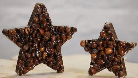 Two Coffee Bean Stars Symbolizing Quality Rating Stock Photos