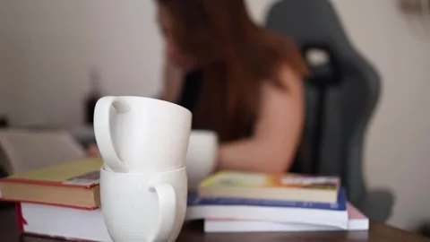 Two coffee cups during a long study session Video stock 341233609