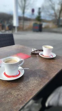 Two Coffee Cups on Outdoor Table Stock Photos