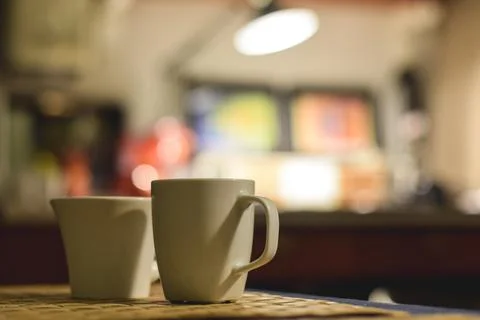 Two coffee cups on the table Stock Photos