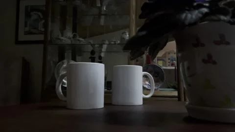 Two coffee mugs on table Stock Footage 225954436