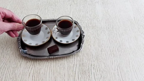 Two Coffees and Chocolate Served on a Tray-A Calm Morning Ritual Stock Footage 312505113