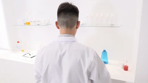Two colleagues and pharmaceutical workers invent new drugs Stock Footage 118044933