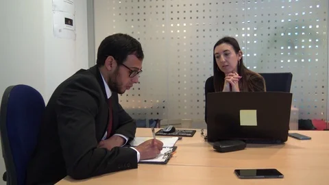 Two colleagues are working in a good mood Stock Footage 126231757